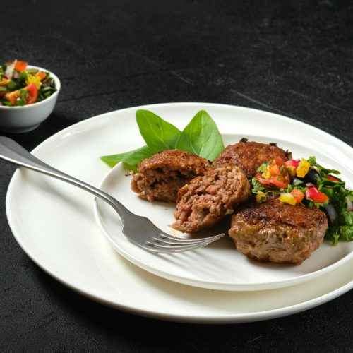 Fried frozen veal meatballs on a plate